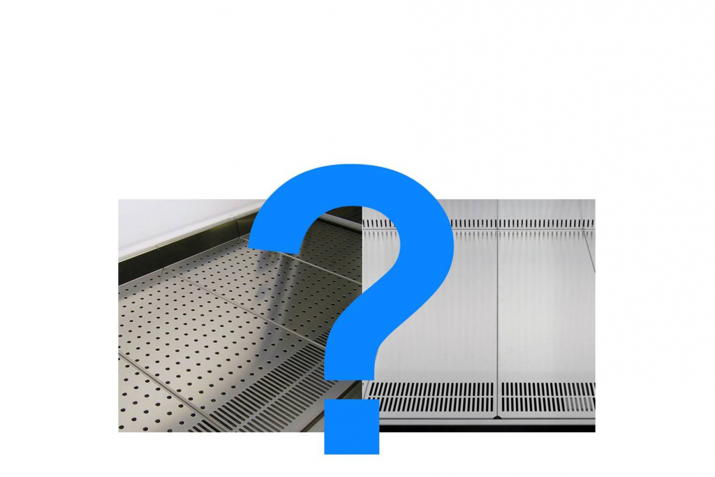 Biosafety cabinet work surface: solid or perforated?